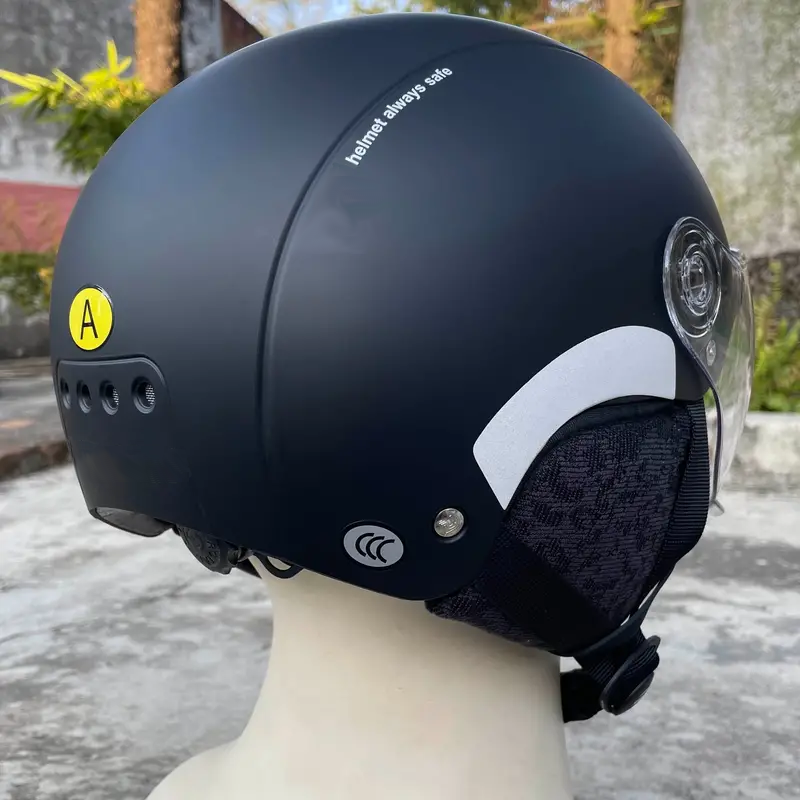 AMA black helmet rear view – Durable protective gear for riders.